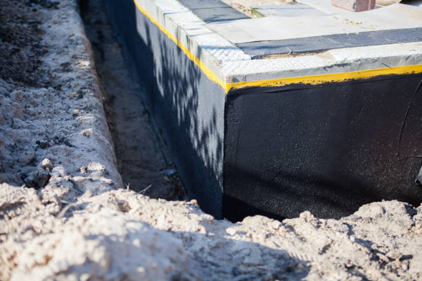 Professional Basement Waterproofing technician working in College Grove, TN